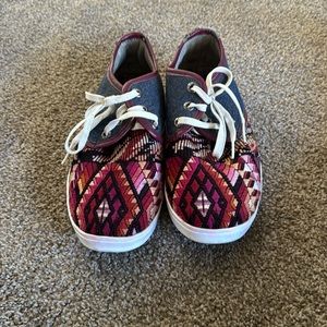 Handmade Shoes, no brand. Native looking print.. a little roughed on the ankles